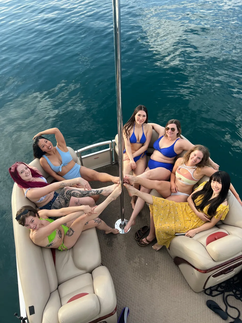 Guests lounging on the boat's bench seating
